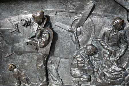 Washington, D.C., USA - November 11, 2017: Bronze bas-relief, showing crew members of the B-17 "Flying Fortress" bomber, on the World War II Memorial located on the National Mall.のeditorial素材