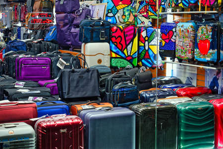 New York City, USA - December 2, 2017: Large number of various Samsonite suitcases and bags can be seen through the shop window.のeditorial素材