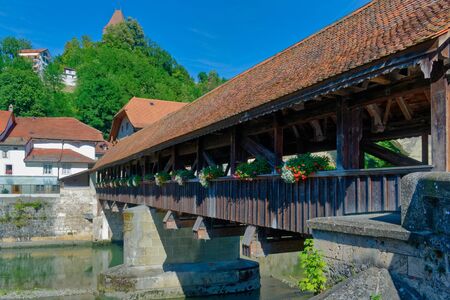 The Bern Bridge (Pont de Berne), the last remaining covered bridge in Fribourg (Freiburg), Switzerlandの写真素材