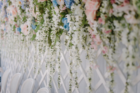 Indoors wedding decoration with acacia garlandsの写真素材