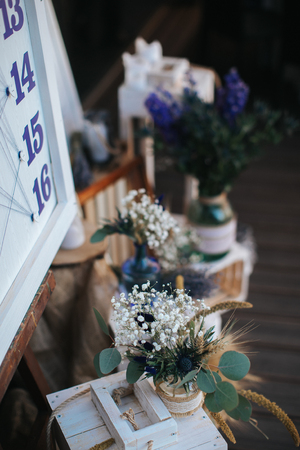 Closeup shot of the rustiÑ wedding decoration elements  at daylightの写真素材
