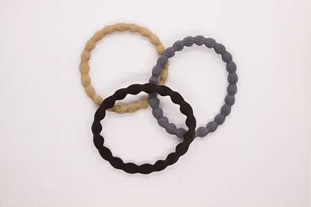 Hair accessories. Three hair ties on a white background