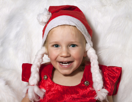 little child with christmas hatの写真素材