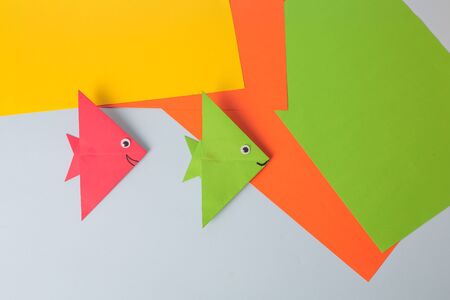 Step by step photo instruction. How to make origami paper fish. DIY for children. Childrens art project craft for kidsの写真素材