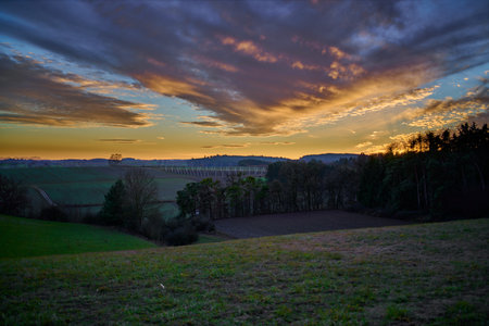 Dramatic sky and sunset over rural fields. High-Dynamic-Range (HDR)の写真素材