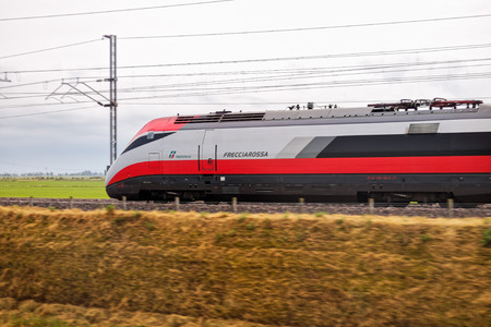Novara, Italy -June 25, 2017: High speed train ride in motion. Italian Frecciarossa running to Milan. Editorial Photoのeditorial素材