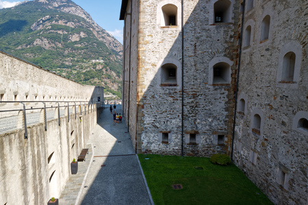 Fort Bard, Valle d'Aosta, Italy - August 18, 2017: Historic military construction defence Fort Bard. Touristic medieval fortress in Italian Alps. Location of the Avengers: Age of Ultron film.のeditorial素材
