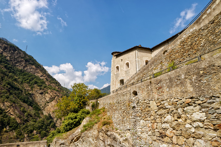 Fort Bard, Valle d'Aosta, Italy - August 18, 2017: Historic military construction defence Fort Bard. Touristic medieval fortress in Italian Alps. Location of the Avengers: Age of Ultron film.のeditorial素材