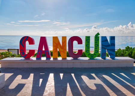Cancun sign in front of Playa Delfines in the Caribbean Sea , Cancun,Mexico, in September 7, 2018のeditorial素材