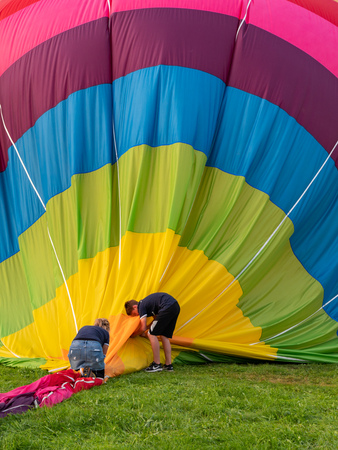 Biella, Italy, June 10, 2018 -Team of people work to pick up and fold the balloon towel after the flight at spring festival, June Pollone dal Cielo, Biellaのeditorial素材