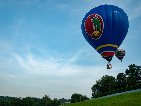 Biella, Italy, June 10, 2018 - Two balloons flight in the sky at the spring festival, June Pollone dal Cielo, Biellaのeditorial素材