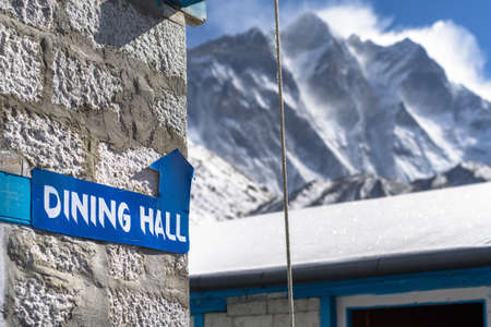 Signpost Dinning hall in Chukung backdrop of Mount Lhotse, 4770 meters, Himalaya, Nepalの写真素材