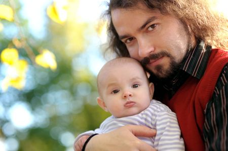 Young father and his little baby