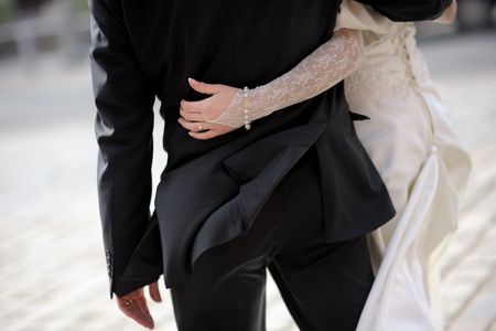 bride girdling groomの写真素材
