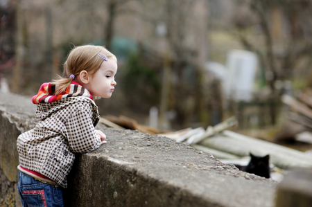 Adorable girl having fun on beautiful spring dayの写真素材