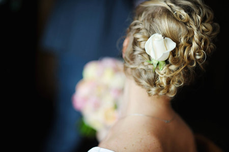 Beautiful bridal haistyle with a rose