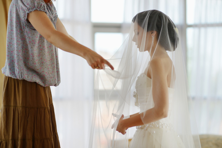 Bride getting ready on the wedding dayの写真素材