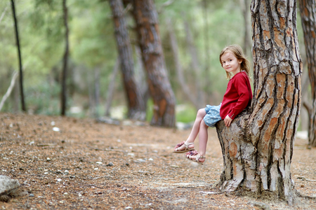 Adorable little girl portrait outdoorsの写真素材