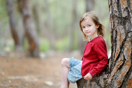 Adorable little girl portrait outdoorsの写真素材