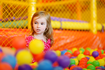 Little girl having fun at the playgroundの写真素材