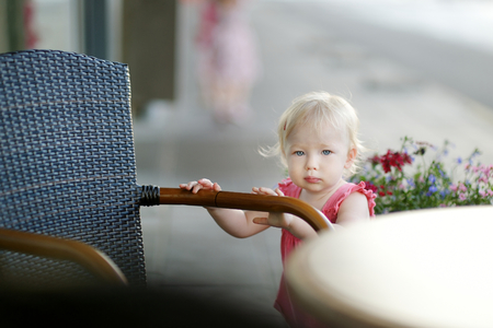 Adorable little girl portrait outdoorsの写真素材