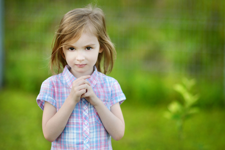 Adorable little girl portrait outdoorsの写真素材