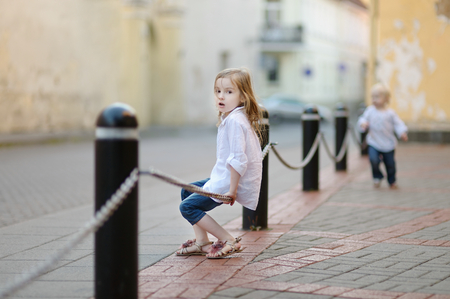Adorable little girl portrait outdoors at summerの写真素材