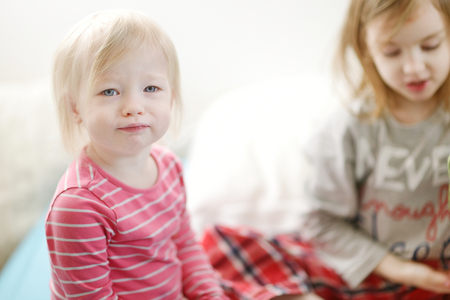 Adorable little girl portrait at homeの写真素材