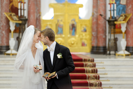 Bride and groom after an orthodox wedding ceremonyの写真素材