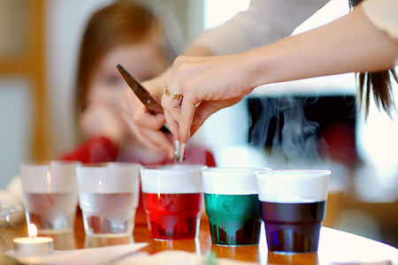 Coloring Easter eggs at homeの写真素材