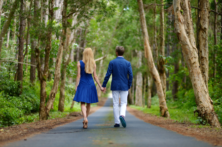 Young beautiful couple having fun in a parkの写真素材