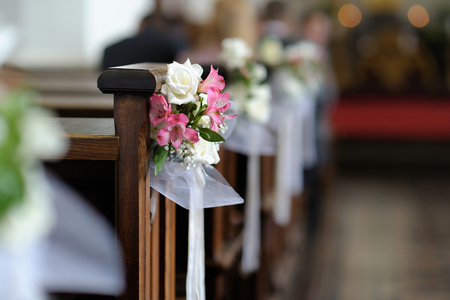 Beautiful flower wedding decoration in a churchの写真素材