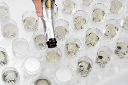 Waiter pouring champagne (top view)の写真素材