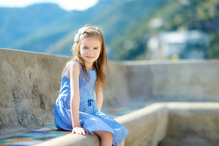 Adorable little girl on warm and sunny summer dayの写真素材