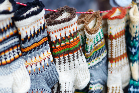 Colorful warm knitted socks sold on Easter market in Vilnius, Lithuaniaの写真素材