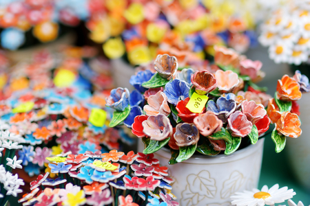 Colorful ceramic flowers sold on Easter market in Vilnius, Lithuaniaの写真素材