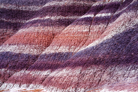 Stunning striped purple sandstone formations of Blue Mesa badlands in Petrified Forest National Park, Arizona, USAの写真素材