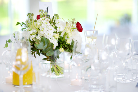 Beautiful table set for some festive event, party or wedding receptionの写真素材