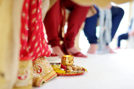 Amazing hindu wedding ceremony. Details of traditional indian wedding. Beautifully decorated hindu wedding accessories. Indian marriage traditions.の写真素材