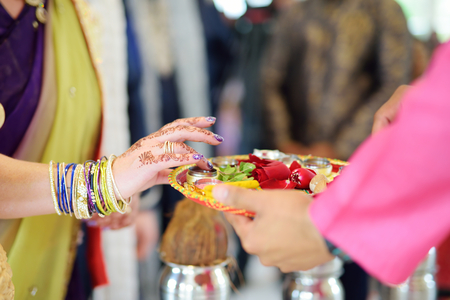Amazing hindu wedding ceremony. Details of traditional indian wedding. Beautifully decorated hindu wedding accessories. Indian marriage traditions.の写真素材