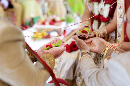 Amazing hindu wedding ceremony. Details of traditional indian wedding. Beautifully decorated hindu wedding accessories. Indian marriage traditions.の写真素材