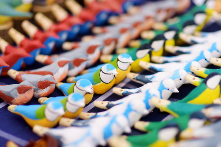 Carved wooden whistles sold on Easter market in Vilnius. Lithuanian capital's annual traditional crafts fair is held every March on Old Town streets.の写真素材