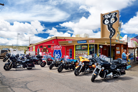 SELIGMAN, ARIZONA, USA - MAY 1, 2016 : Colorful Route 66 decorations in Seligman Historic District. Seligman was on the original U.S. Route 66 until Interstate 40 bypassed it a couple miles south.のeditorial素材