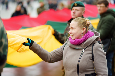 VILNIUS, LITHUANIA - MARCH 11, 2017: Thousands of people taking part in a festive events as Lithuania marked the 27th anniversary of its independence restoration.のeditorial素材