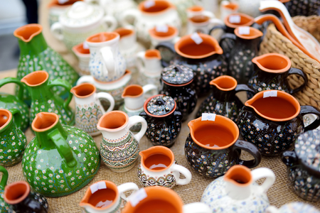 Ceramic dishes, tableware and jugs sold on Easter market in Vilnius. Lithuanian capital's annual traditional crafts fair is held every March on Old Town streets.の写真素材
