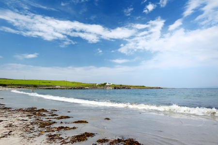 Wide sandy beach on Inishmore, the largest of the Aran Islands in Galway Bay, Ireland. Famous for its strong Irish culture, loyalty to the Irish language, and a wealth of ancient sites.の写真素材