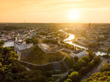 Aerial view of Gediminas' Tower, the remaining part of the Upper Castle in Vilnius. Sunset landscape of  Old Town of Vilnius, the heartland of the city, Lithuania.の写真素材