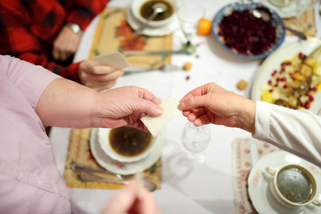 Traditional Christmas Eve dinner in Lithuania, held on the twenty fourth of December. The meal is a family occasion which includes many traditions of both pagan and Christian origin.の写真素材
