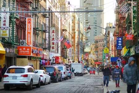 NEW YORK - MARCH 21, 2015: Street view of Chinatown district of New York City, one of oldest Chinatowns outside Asia.のeditorial素材