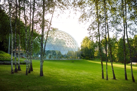 MERKINE, LITHUANIA - AUGUST 12, 2017: Merkine Pyramid, protected by a glass dome, famous for healing and spiritual uplifting. People come to meditate, concentrate and escape from everyday troubles.のeditorial素材
